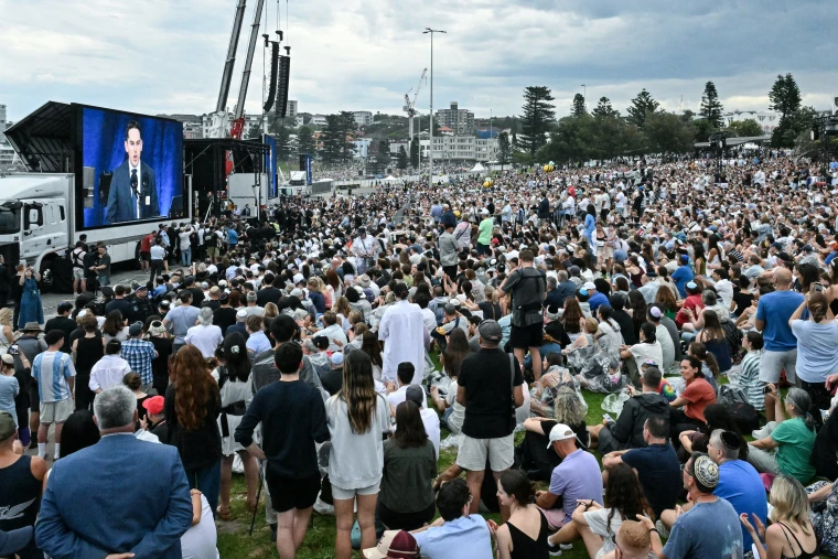 Snipers guard mourners as thousands mark one week since Bondi Beach massacre